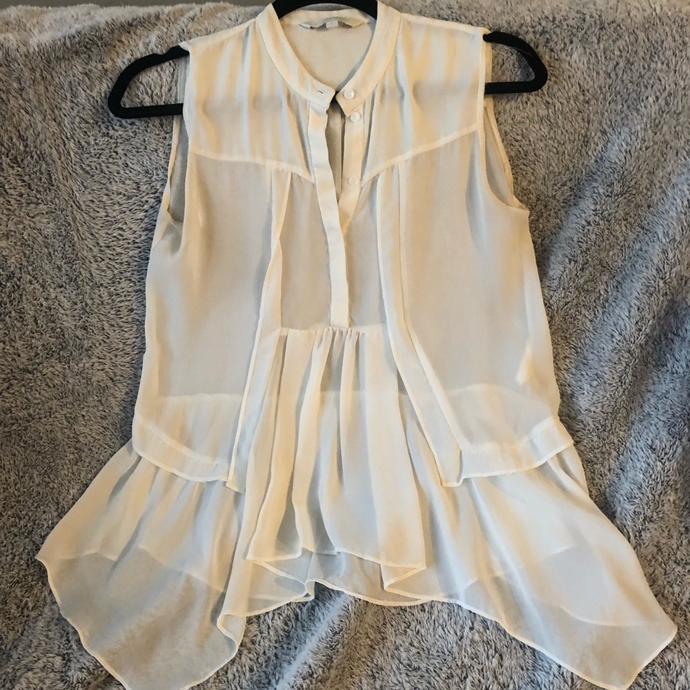Off white sheer sleeveless top by Eryn Brinie